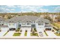Aerial view of townhomes showcasing well-maintained grounds and convenient garage parking at 7782 93Rd N St, Seminole, FL 33777