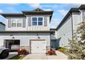 Charming townhome with a two-car garage and carefully manicured landscaping at 7782 93Rd N St, Seminole, FL 33777