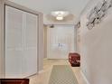 Inviting foyer featuring elegant decor and ample closet space at 1340 Gulf Blvd # 6E, Clearwater Beach, FL 33767