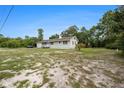 Charming single-story home featuring a spacious lot and classic architecture at 12651 Tinley Rd, New Port Richey, FL 34654