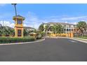 Welcoming Palm River community entrance with manicured landscaping and modern signage at 4405 Tuscan Loon Dr, Tampa, FL 33619