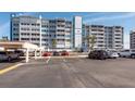 The condo building is visible from the parking lot at 500 Treasure Island Cswy # 402, Treasure Island, FL 33706