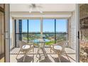 Balcony with seating featuring views of the city and water at 10355 Paradise Blvd # 614, Treasure Island, FL 33706