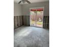 A Living Room featuring a sliding glass door to the outside at 1774 Michigan Ne Ave, St Petersburg, FL 33703