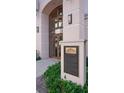Building entrance with historic marker and well-maintained landscaping at 146 4Th Ne Ave # 204, St Petersburg, FL 33701