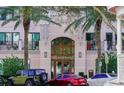 Beautiful building entrance with palm trees and well-maintained landscaping at 146 4Th Ne Ave # 204, St Petersburg, FL 33701