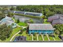 The property boasts a serene pond view and lush landscaping, creating a peaceful retreat at 20890 Negril Ct # 5, Lutz, FL 33558