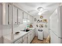 Cozy kitchen with white appliances and ample counter space at 4222 Richmere Dr # 4222, New Port Richey, FL 34652