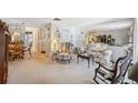 Inviting living room with neutral carpet and comfortable seating at 4222 Richmere Dr # 4222, New Port Richey, FL 34652