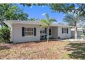 Well-kept single-story home featuring a mature landscaping, tidy facade at 917 2Nd Nw Ave, Largo, FL 33770