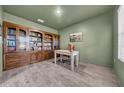 Office with custom built-in bookcase and natural light at 3301 San Moise Pl, Plant City, FL 33567