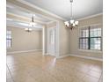 Spacious living room with tile floors and an abundance of natural light from multiple windows at 15708 Oakleaf Run Dr, Lithia, FL 33547