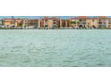 Scenic waterfront condo view overlooking the tranquil bay and private boat docks at 8911 Blind Pass Rd # 220, St Pete Beach, FL 33706