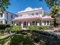 Beautiful two-story home with lush landscaping and well-manicured lawn at 2513 W Morrison Ave, Tampa, FL 33629