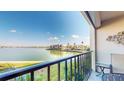 Balcony view of lush landscaping and waterway at 7700 Sun Island S Dr # 208, South Pasadena, FL 33707