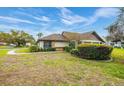 Beautiful home exterior showcasing manicured bushes and an inviting walkway at 7703 Rockville Ct # 0, New Port Richey, FL 34654