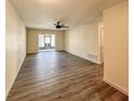 Spacious living room featuring modern flooring and natural light at 9221 Repondo Pl, New Port Richey, FL 34655