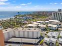 High angle aerial shot of the apartment and complex near the beach and the bay at 1100 N Shore Ne Dr # 304, St Petersburg, FL 33701