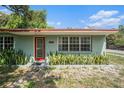 Charming single-story home with mature landscaping at 1920 E Clifton St, Tampa, FL 33610