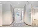 Condo entryway opening to a bright, open space with city views at 1209 E Cumberland Ave # 1703, Tampa, FL 33602