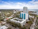 Attractive aerial view of condo community situated near green spaces and open water at 105 4Th Ne Ave # 405, St Petersburg, FL 33701