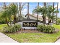 Turtle Creek community sign surrounded by lush greenery and landscaping at 30 Stanton Cir, Oldsmar, FL 34677
