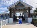 Welcoming Mirada community entrance with a decorative gate, providing a secure and attractive entry point for residents at 31251 Mango Fade Way, San Antonio, FL 33576