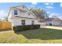 This well-maintained home offers a beautifully landscaped yard and a privacy fence at 1801 Rudder Dr, Valrico, FL 33594