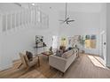 Bright living room showcases an open floor plan, modern decor, and ample natural light at 1801 Rudder Dr, Valrico, FL 33594