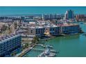 Scenic view of condo buildings with dock access to the ocean at 240 108Th Ave # 102, Treasure Island, FL 33706