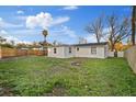Spacious backyard provides ample space for recreation and outdoor activities at 5220 Pine St, Seffner, FL 33584