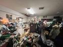 Interior view of a cluttered room, packed with numerous items and debris, showing disorganization at 12588 128Th Ave, Largo, FL 33774