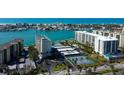 Waterfront condo with community pool and tennis courts, with boat docks on the serene bay at 660 Island Way # 202, Clearwater Beach, FL 33767