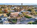 Aerial view of a quaint neighborhood with mature trees, private homes and manicured lawns at 6709 Cardinal S Dr, St Petersburg, FL 33707