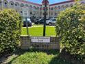 Well-maintained Rila Renaissance building entrance featuring mature landscaping at 2431 Franciscan Dr # 45, Clearwater, FL 33763