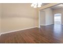 Spacious dining room with hardwood floors, recessed lighting, and neutral paint at 29636 Tee Shot Dr, San Antonio, FL 33576