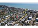 Scenic aerial view highlighting the home's short proximity and easy access to the stunning beach at 305 160Th Ter, Redington Beach, FL 33708
