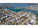 Aerial view of the neighborhood with easy access to the bay and ocean at 305 160Th Ter, Redington Beach, FL 33708