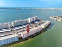 Breathtaking aerial view of a waterfront condo community with stunning water views at 6025 Shore S Blvd # 410, Gulfport, FL 33707