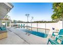 Enjoy this private backyard pool oasis and lounging area perfect for relaxation at 1485 54Th Ne Ave, St Petersburg, FL 33703