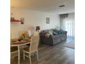 Inviting living room and dining area with modern flooring and natural light at 2700 Bayshore Blvd # 2308, Dunedin, FL 34698
