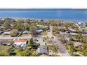 Waterfront home with beautiful ocean views and mature landscaping is surrounded by peaceful nature at 202 Dunkirk Rd, Oldsmar, FL 34677
