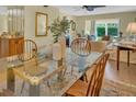 Inviting living room with lots of natural light, comfortable seating, and stylish decor at 3401 Stonehaven E Ct # A, Palm Harbor, FL 34684