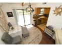 Cozy dining area with sliding glass doors and natural light at 2332 Seward Dr, Sarasota, FL 34234
