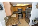 Well-equipped kitchen with stainless steel appliances and granite countertops at 2332 Seward Dr, Sarasota, FL 34234