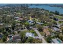 Expansive aerial view of a waterfront community showcasing homes, lush landscaping, and water views at 524 Park S St, St Petersburg, FL 33707