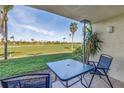 Relaxing outdoor seating area overlooking the meticulously maintained golf course at 6181 Bahia Del Mar Blvd # 112, St Petersburg, FL 33715