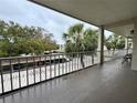 View from the balcony showing covered parking at 946 Virgina # 304, Dunedin, FL 34698