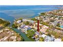 An aerial view of a charming waterfront home with direct access to the bay at 4834 W Flamingo Rd, Tampa, FL 33611