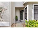 Inviting front entrance with a covered porch and stylish exterior accents at 5100 Burchette Rd # 1606, Tampa, FL 33647